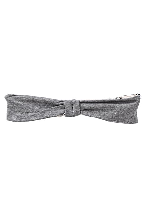 Bandeau réversible pour bébé fille <br>1 côté gris chiné uni, 1 côté blanc imprimé graphique ethnique noir exclusif IKKS <br>Nœud fixe, bande élastiquée au dos by IKKS