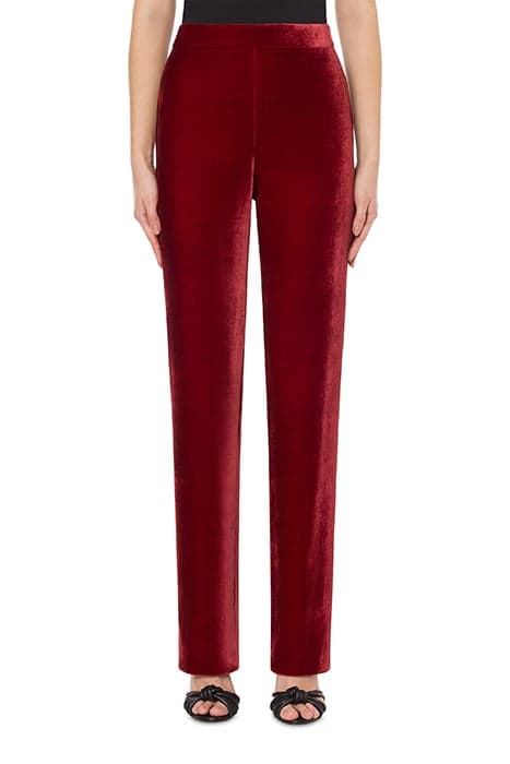 PANTS IN PANNÉ VELVET RED by Moschino